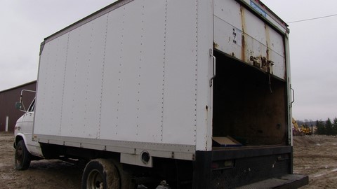 14 ft Grumman van body truck box, will wood floor, wood walls, roll up rear door.